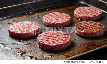 Homemade meatballs with white beans and fresh herbs. Cast-iron frying pan full of delicious fried meat cutlets 124736092