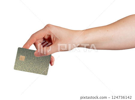 Card in hand. Client showing plastic bank credit and debit object with chip, green and yellow Card in hand. Client showing plastic bank credit and debit object with chip, green and yellow 124736142