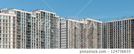 Building with modern architecture. Multistorey condominium with panoramic facade, tall structure, Building with modern architecture. Multistorey condominium with panoramic facade, tall structure, 124736635