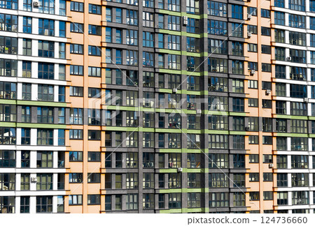 Building facade with pattern and balcony. Multi storey condominium, highrise residence, modern 124736660