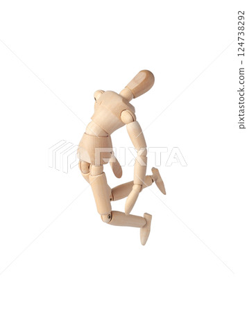 A Wooden dummy jumping, full of inspiration. A Poseable figure and Articulated mannequin capture a moment of excitement, perfect for artists and creating dynamic, energetic sketches. 124738292