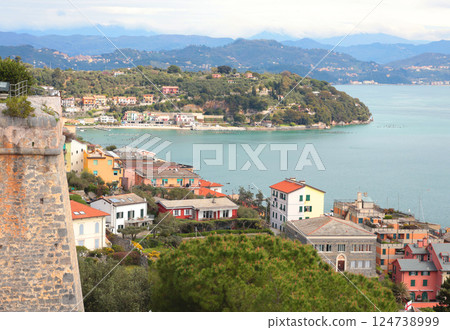 Traditional buildings. Castle, stone wall in town of Porto Venere, Liguria. Sea and tourism in Italy. Nature in mountains.  124738999