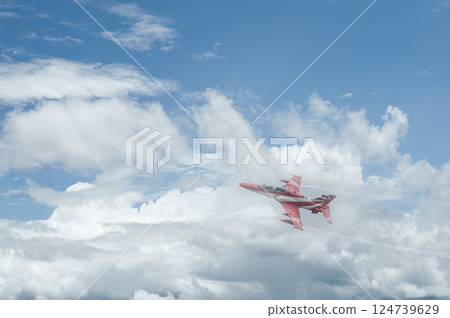 Fighter jet flies through the sky on technology background 124739629