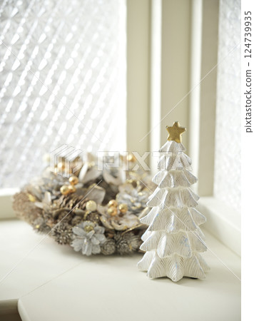 Christmas decorations on the windowsill 124739935