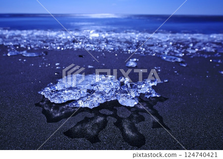 Jewelry ice on the beach 124740421