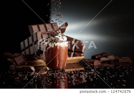 Hot chocolate with whipped cream sprinkled with chocolate crumb. Hot chocolate with whipped cream sprinkled with chocolate crumb. 124742876