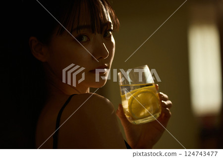 Skin care image of a young woman photographed in warm tones Skin care image of a young woman photographed in warm tones 124743477