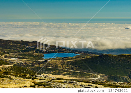 Clouds above mountain. Serra da Estrela in Portugal. Torre peak. Clouds above mountain. Serra da Estrela in Portugal. Torre peak. 124743621