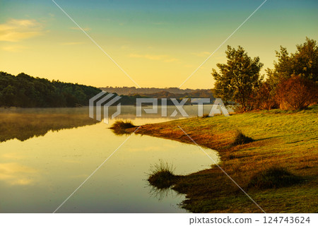 Morning fog over lake in Portugal 124743624