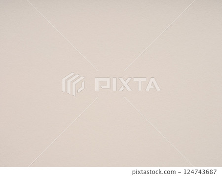 The warm beige of this textured paper offers a comforting embrace to creative spirits and the promise of artistry 124743687