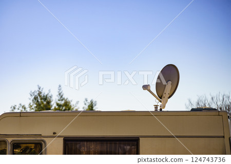 Satellite dish on roof of motor home 124743736