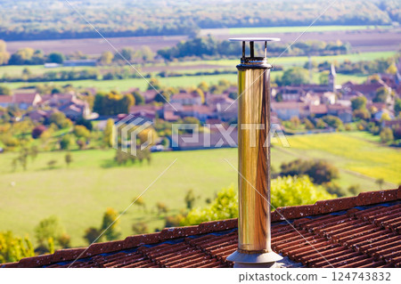 Chimney on roof and valley landscape in Lorraine France 124743832