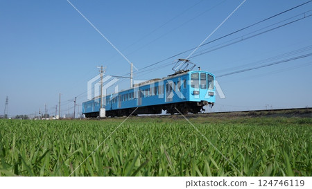 Fresh green wheat fields and the Ohmi Railway Fresh green wheat fields and the Ohmi Railway 124746119