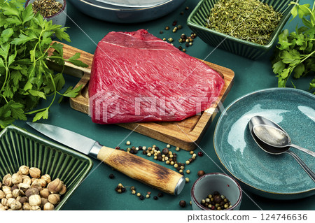 Fresh raw beef steak sirloin with spices. 124746636