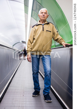European old man going down to subway 124746948