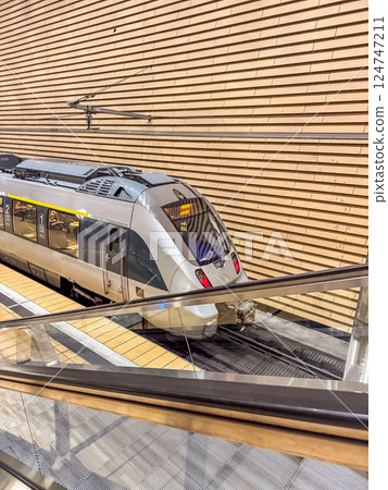 Modern High-Speed Train at Station Platform, Urban Transportation, Public Transit, Travel. High quality photo Modern High-Speed Train at Station Platform, Urban Transportation, Public Transit, Travel. High quality photo 124747211