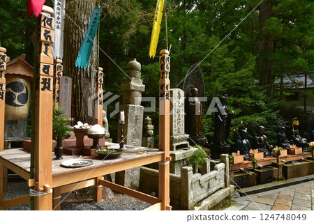 Offerings and water-filled Jizo at Okunoin, Mount Koya during Obon 124748049