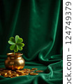 Boiler with gold and clover - a symbol of good luck 124749379