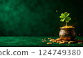 Boiler with gold and clover - a symbol of good luck 124749380