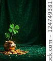 Boiler with gold and clover - a symbol of good luck 124749381