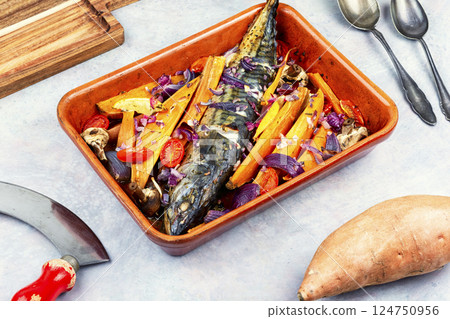 Mackerel with roasted vegetables on a tray. Mackerel with roasted vegetables on a tray. 124750956
