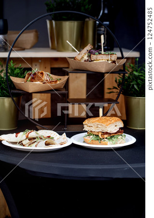 Gourmet Sandwich Tower Display Restaurant Setup 124752485