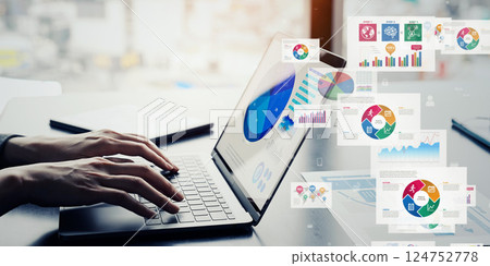 Woman using laptop and digital data concept 124752778
