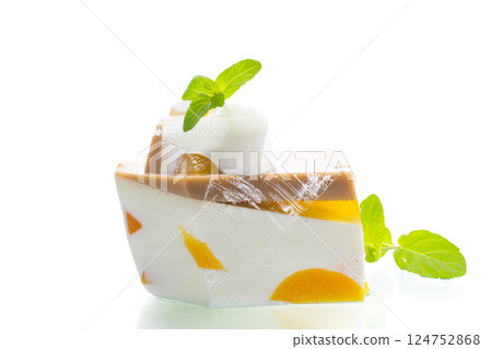 peach pieces inside milk fruit jelly 124752868