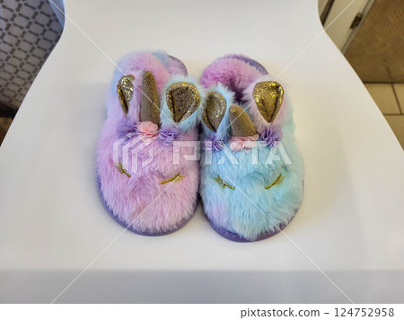 Cute Fluffy Colorful Baby Slippers with Unicorn Horn and Ears. 124752958