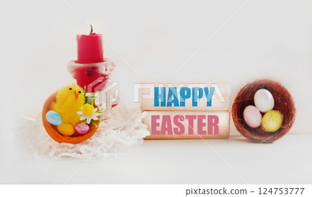 A bright, positive Easter Spring composition. Easter inscription on wooden blocks A bright, positive Easter Spring composition. Easter inscription on wooden blocks 124753777