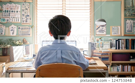 Rear view of a boy studying in a child's room, generative AI_wide 124753848