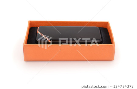 Cigarette lighter in gift box isolated on white. Cigarette lighter in gift box isolated on white. 124754372