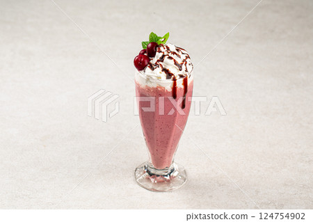 Glass of sweet fresh cherry milkshake Glass of sweet fresh cherry milkshake 124754902