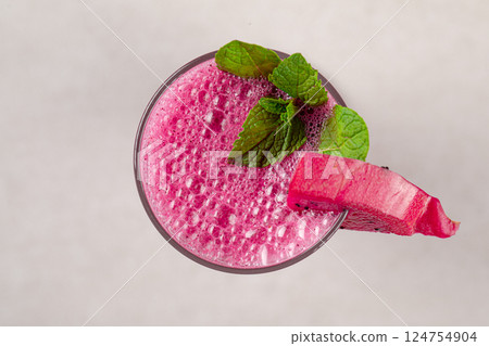 Glass of dragon fruit pitahaya smoothie with mint Glass of dragon fruit pitahaya smoothie with mint 124754904
