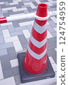 Triangular cone installed on the road 124754959