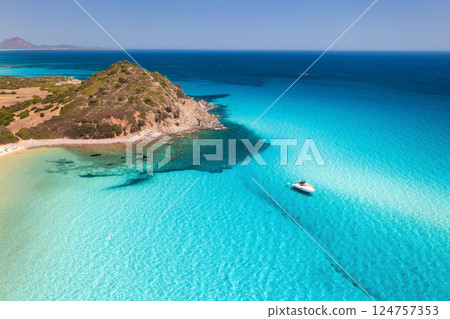Aerial view of luxury yacht on blue sea at sunset in summer 124757353