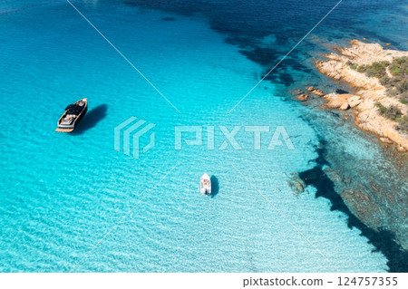 Aerial view of luxury yacht and boat in blue sea in summer 124757355
