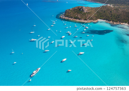Aerial view of luxury yachts and boats on blue sea at sunny day 124757363