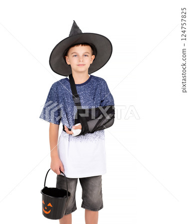 Portrait emotional boy black witch hat, bucket pumpkin Jack sweet candies. Isolated white background Portrait emotional boy black witch hat, bucket pumpkin Jack sweet candies. Isolated white background 124757825