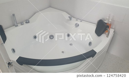 Jacuzzi bathtub interior in bathroom 124758420