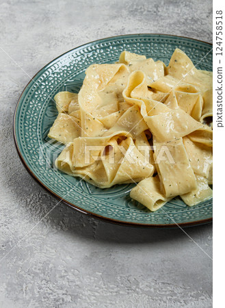 pasta papardelle in creamy garlic sauce, traditional Italian cuisine, pasta carbonara, homemade, no people, 124758518