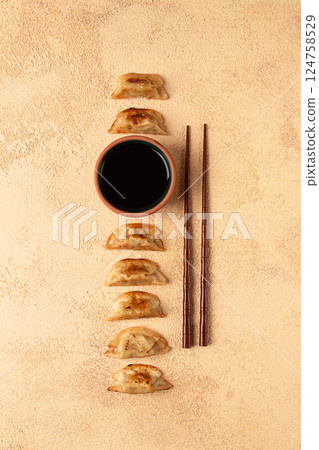 japanese fried dumplings, gyoza, sesame seeds, top view, no people, 124758529