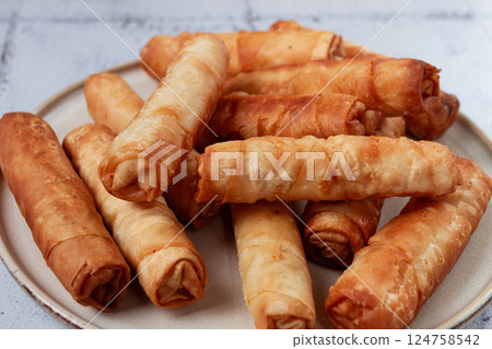 fried spring rolls with cheese, on a plate, with cream sauce, no people, fried spring rolls with cheese, on a plate, with cream sauce, no people, 124758542