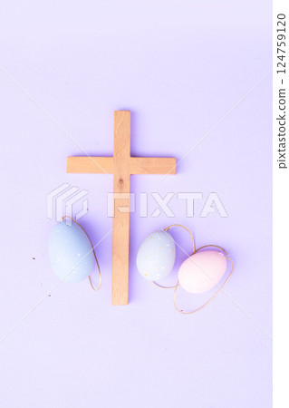 Wooden cross with painted eggs Wooden cross with painted eggs 124759120