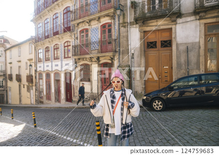 Vibrant Street Style Captured in a Historic Urban Setting Full of Character and Charm 124759683