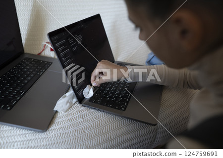 Cleaning Your Laptop Keyboard for Improved Efficiency and Enhanced Overall Productivity Levels Cleaning Your Laptop Keyboard for Improved Efficiency and Enhanced Overall Productivity Levels 124759691
