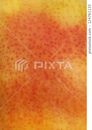 Pear red with yellow color as background macro photo. 124761135