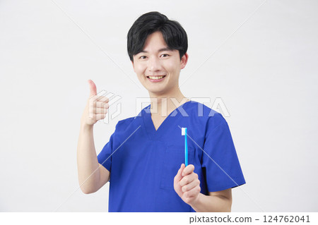 Dentist man with toothbrush good sign white background 124762041