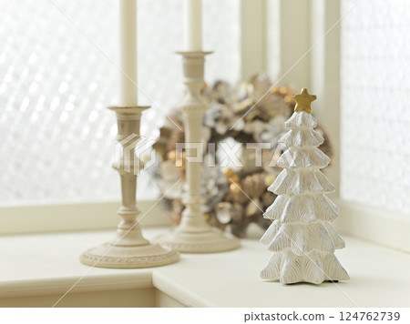 Christmas tree and wreath decorated by the window - Christmas image Christmas tree and wreath decorated by the window - Christmas image 124762739