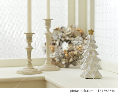 Christmas tree and wreath decorated by the window - Christmas image 124762740